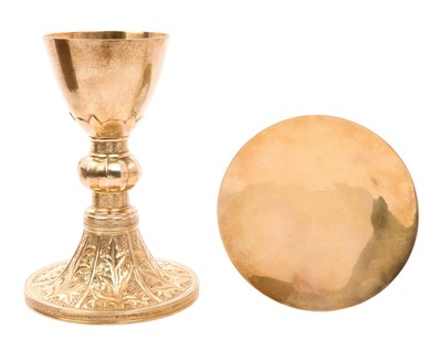 Lot 404 - 1930s silver gilt Communion chalice, and paten in a wooden case