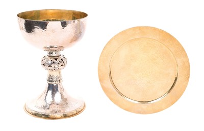 Lot 405 - Contemporary silver Communion chalice, with spot hammered finish and stem with pierced knop
