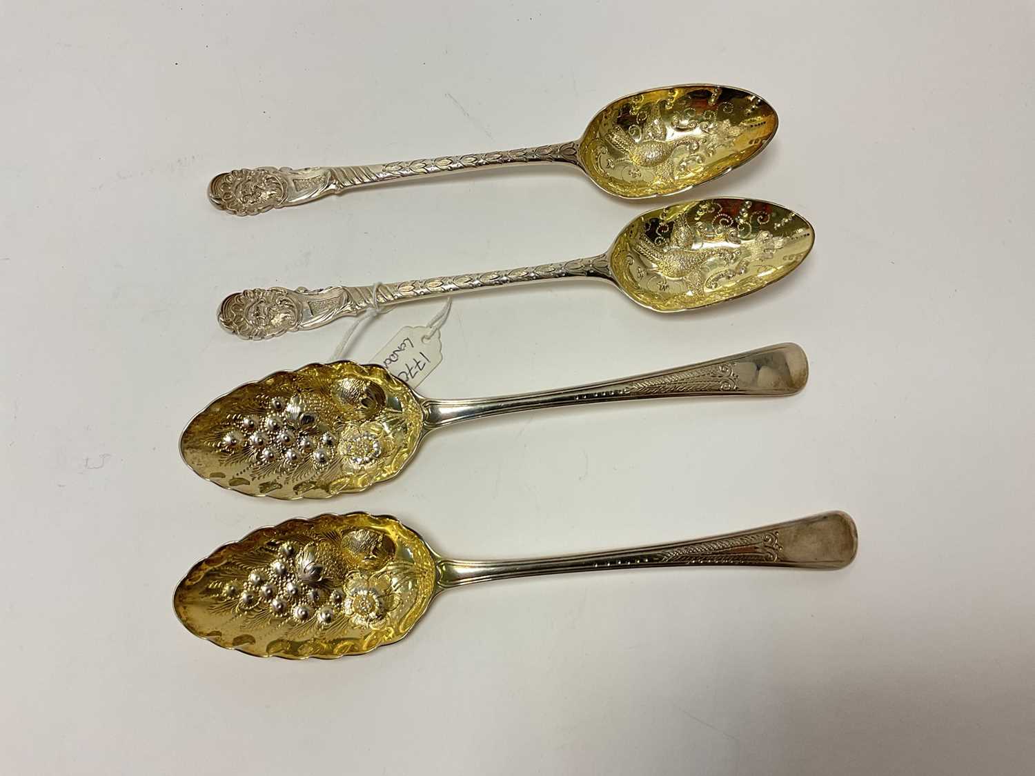 Lot 3 - Two pairs of Georgian silver berry spoons, including one pair hallmarked London 1770 (Thomas & William Chawner), and another pair London 1782/3, approx 8.8 troy oz in total