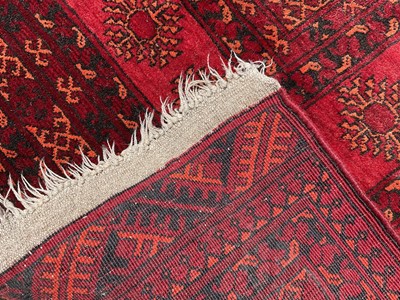 Lot 1635 - Turkoman rug with two rows of six quartered medallions