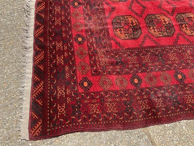Lot 1635 - Turkoman rug with two rows of six quartered medallions