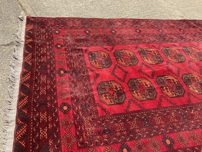 Lot 1635 - Turkoman rug with two rows of six quartered medallions
