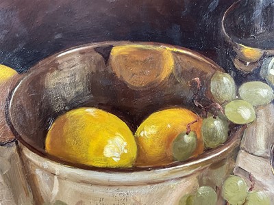 Lot 17 - Ruth Bowyer, contemporary, oil on board - Still Life Grapes and Lemons, 29cm x 39.5cm, signed, in gilt frame