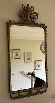 Lot 1371 - Late 18th / Early 19th Continental gilt framed wall mirror with urn and scroll mouldings