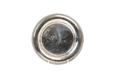 Lot 587 - George III silver circular dish with engraved crest