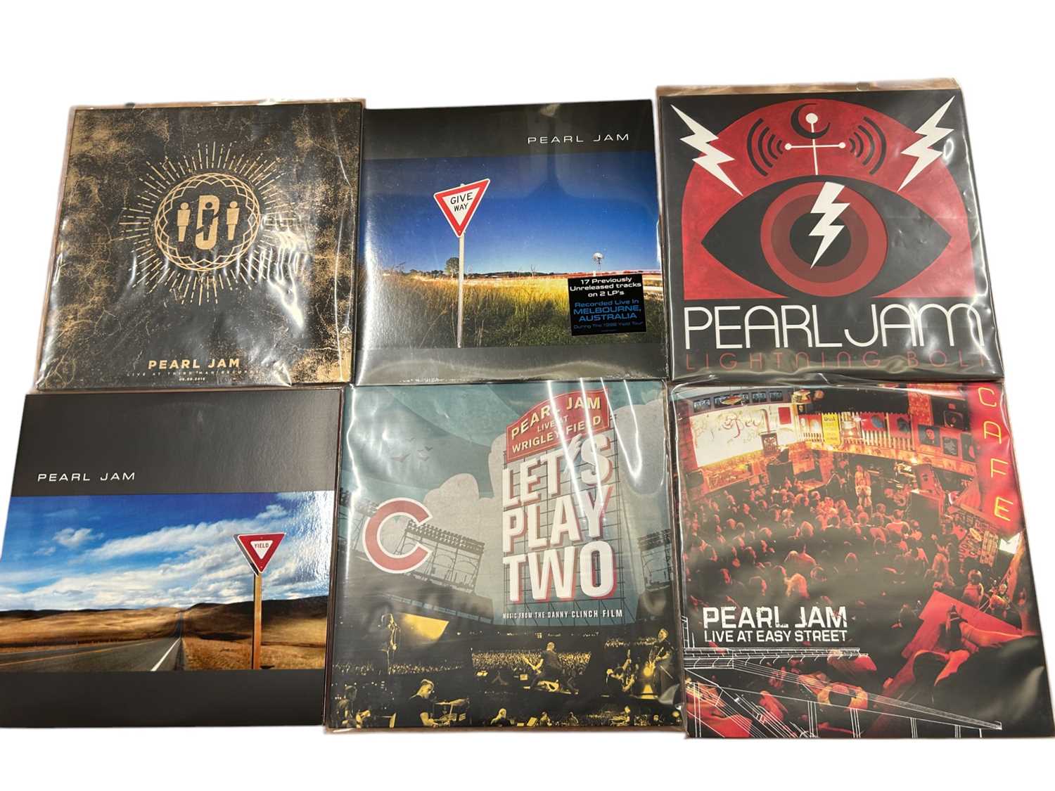 Lot 2211 - Selection of approx 30 LP's including Pearl Jam, Sonic Youth, The Kills and Bob Mould. All vinyl appears unplayed. Storge box not included.