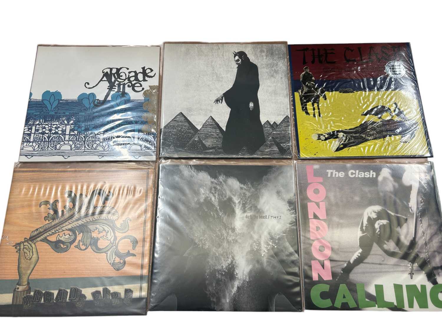 Lot 2213 - Selection of 30 LP's including The Clash, Beth Gibbons, Girls against Boys, Gomez, Green River, Foo Fighters, Garbage, Arcade Fire and Brittany Howard. All vinyl appears unplayed. Stora...