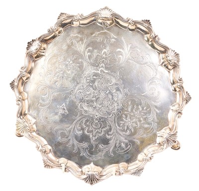 Lot 489 - Silver salver with scrollwork and scallop shell edge
