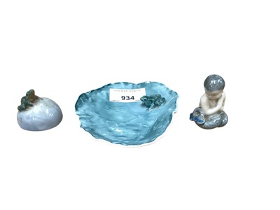 Lot 934 - Royal Copenhagen porcelain model of a frog on a Lilly pad, no. 2477, together with a mermaid, no. 2313 and a frog on a rock, no. 507 (3)