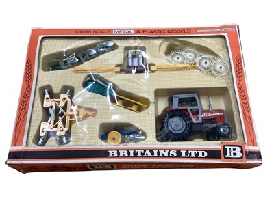 Lot 1681 - Britains Massey Ferguson Tractor & Farm Implements including Ploughs, Acrobatic Rake, Crop Spray, Mower & Disc Harrow, boxed No.9592 (1)