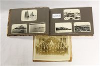 Lot 2466 - An album of 1930s photographs - HMS Cumberland...