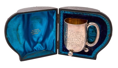 Lot 419 - Victorian silver christening mug, with engraved fern leaf decoration, armorial crest and name