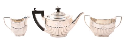 Lot 420 - Victorian three piece tea set, comprising teapot of half fluted form, with hinged domed cover