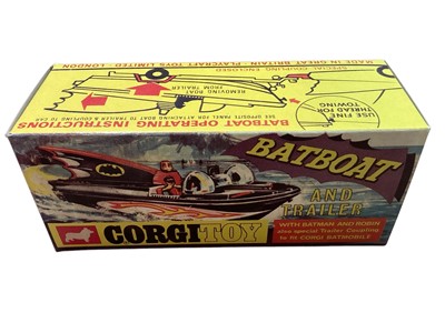 Lot 1649 - Corgi Toys Batmobile (Robin missing) & Batboat, both in reproduction boxes (2)