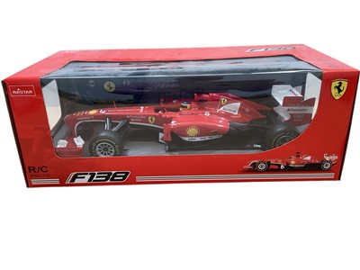 Lot 1677 - Rastar 1:12 scale Ferrari F138 radio controlled racing car, 1:24 scale Top Fuel Dragster & replica 1940's plastic service station (3)