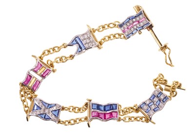Lot 634 - Good quality diamond ruby and sapphire bracelet with six naval flags