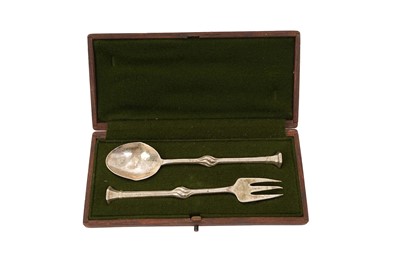 Lot 510 - Arts and Crafts silver spoon and fork set in a fitted case (London 1906) Ramsden & Carr