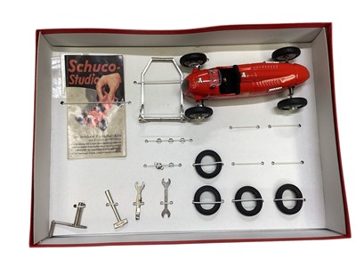 Lot 1832 - Schuco clockwork racing car assembly kits including Grand Prix Racer Bausatz, Studio II Bausatz & Studio, all boxed in sleeves (3)