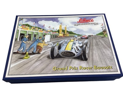 Lot 1832 - Schuco clockwork racing car assembly kits including Grand Prix Racer Bausatz, Studio II Bausatz & Studio, all boxed in sleeves (3)