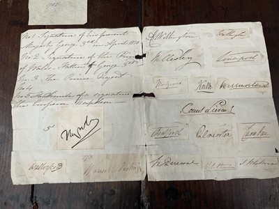 Lot 914 - Collection of signatures, stuck to a folded sheet of laid paper, annotated with some of the signatures - No 1 - signature of his majesty George 3rd in April 1810; No 2 - Signature of a the Princ...