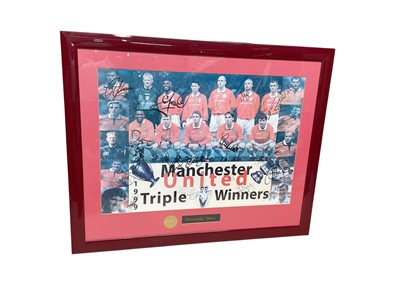 Lot 376 - Framed Manchester United 1999 treble winners poster signed by the team