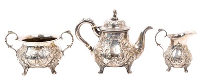 Lot 495 - Unusual three piece silver teaset with chinoiserie decoration