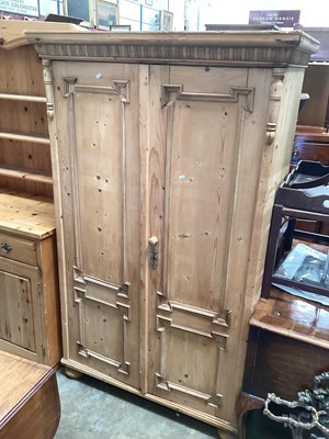 Lot 1282 - Panelled pine two door wardrobe