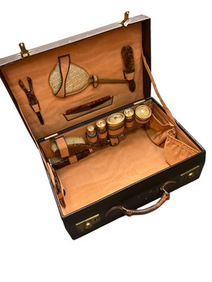 Lot 397 - Vintage leather dressing case with fitted interior