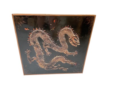 Lot 585 - Brown 1970's plastic? relief wall panel depicting an Dragon, 61 x 61cm