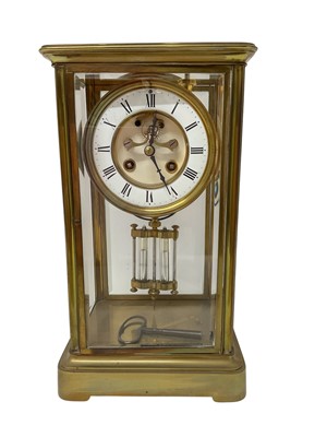 Lot 619 - French brass cased four glass mantel clock