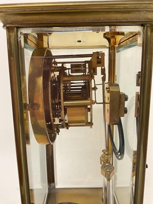 Lot 619 - French brass cased four glass mantel clock