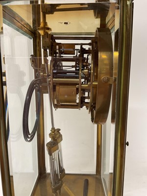 Lot 619 - French brass cased four glass mantel clock