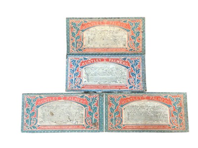 Lot 2456 - Two large tin trunks containing a large collection of antique biscuit tins, including Huntley & Palmers