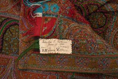Lot 15 - The gift of H.M. Queen Victoria, fine Indian Kashmir shawl of intricate traditional design including with figures with sewn label ' Horatia E Erskine, June 26th 1861 ( Indian) from H.M.Queen Vict...