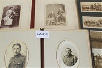 Lot 2552 - Victorian photographs in two heavy leather...