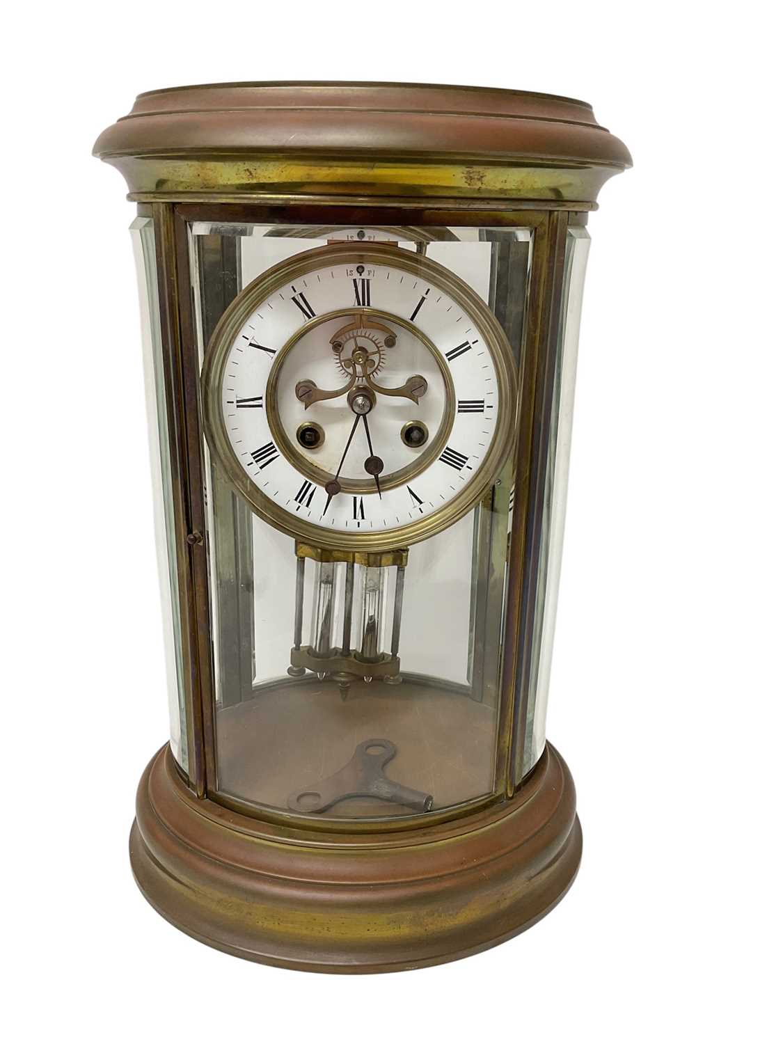 Lot 620 - French oval brass cased four glass mantel clock