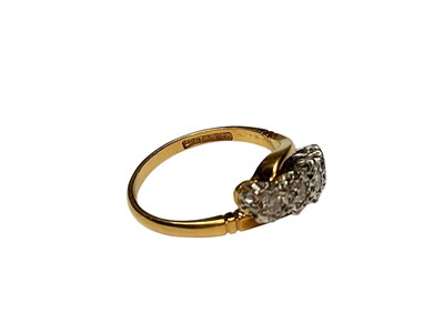 Lot 75 - 1930s diamond five stone ring in platinum crossover illusion setting on 18ct gold shank, stamped 'Bravingtons'.