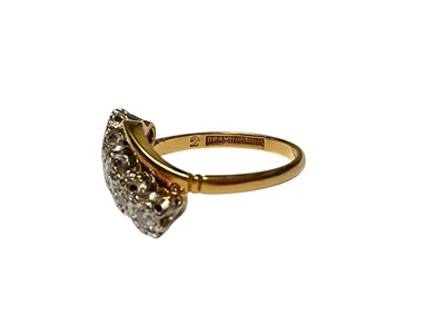 Lot 75 - 1930s diamond five stone ring in platinum crossover illusion setting on 18ct gold shank, stamped 'Bravingtons'.