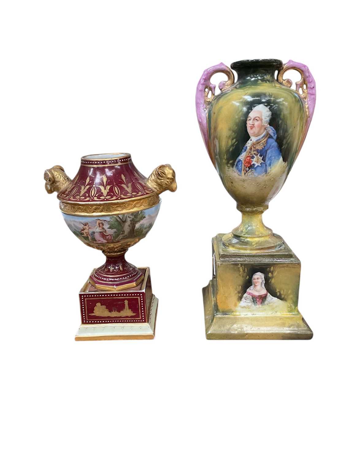 Lot 22 - Two Vienna porcelain twin handled vases, including one with Royal portraits, the other painted with figures in a landscape