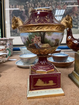 Lot 22 - Two Vienna porcelain twin handled vases, including one with Royal portraits, the other painted with figures in a landscape