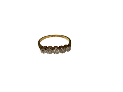 Lot 76 - Edwardian diamond five stone ring with five old cut diamonds in platinum millegrain setting on 18ct gold shank