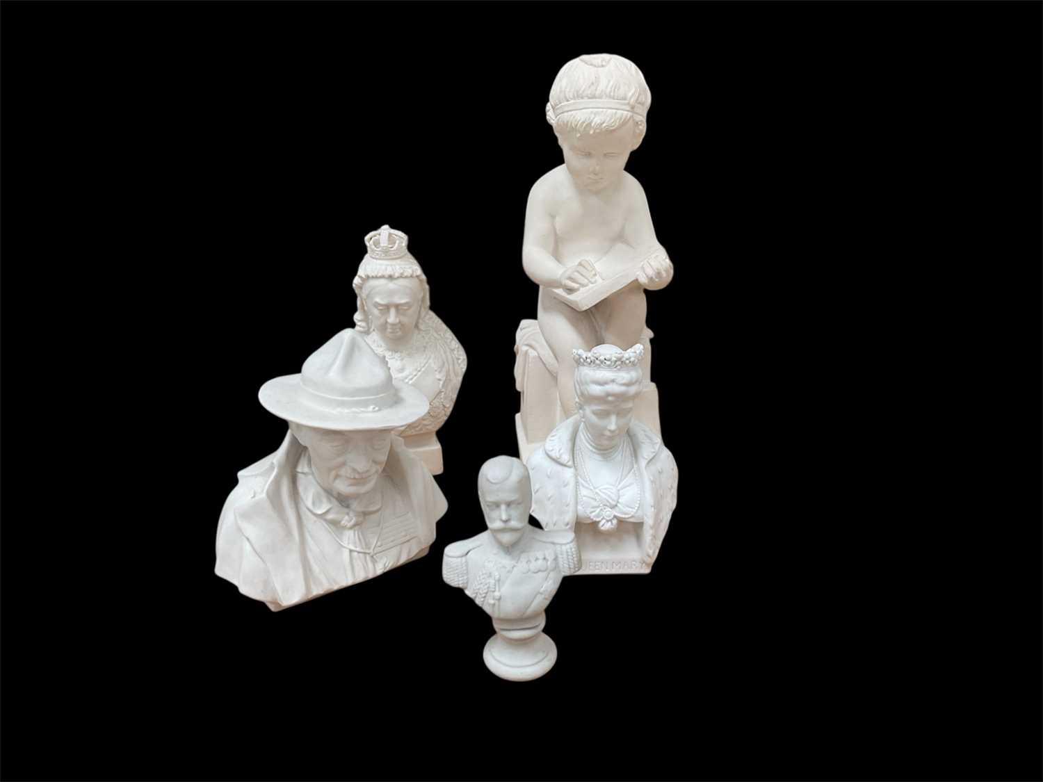 Lot 24 - Plaster figure of a child writing, together with a Coalport bust of Baden-Powell, and Parian ware busts of Queen Victorian, Queen Mary, and King George V (5)