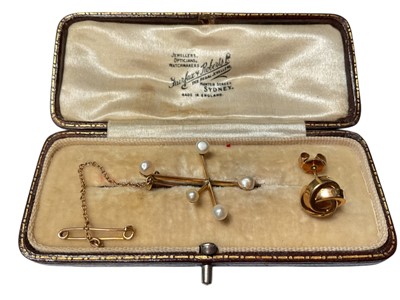 Lot 80 - Early 20th century gold and seed pearl 'Southern Cross' brooch, silver charm bracelet etc