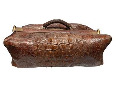 Lot 2071 - Large Hornback Crocodile skin Gladstone bag with brass fittings.