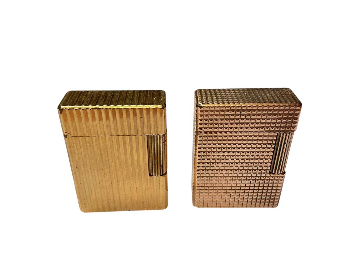 Lot 25 - Two DuPont gold plated lighters