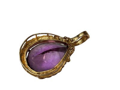 Lot 113 - Large amethsyt and diamond pear shaped pendant
