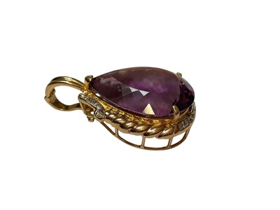 Lot 113 - Large amethsyt and diamond pear shaped pendant