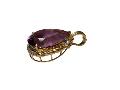 Lot 113 - Large amethsyt and diamond pear shaped pendant