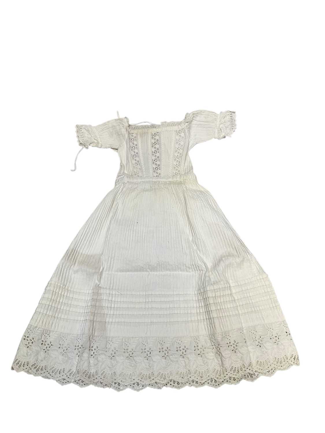 Lot 2090 - Lot of Victorian and Edwardian baby and children's clothing including cut-out work cropped bodice, heavy cotton and lace dress, Christening gown, white lawn embroidered coat with Irish crochet,...