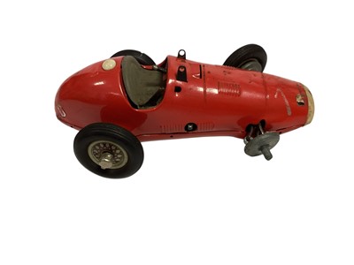 Lot 1842 - Dan Dare (c1950's) tin plate friction unboxed SS Eagle Earth-Mars-Venus Express (cockpit cover missing) & Schucco Ferrari 1070 unboxed clockwork Grand Prix Racer (wheel missing) (2)